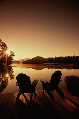 A Pair Of Adirondack Chairs On A Dock Photograph by 