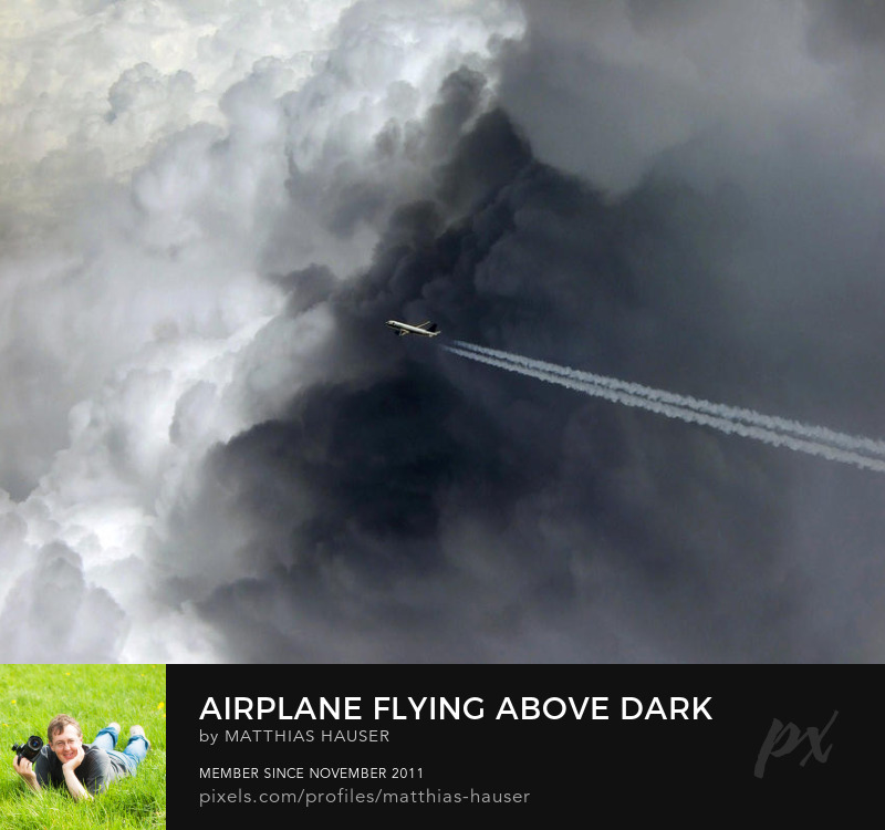 Airplane and Dark Clouds Art Print