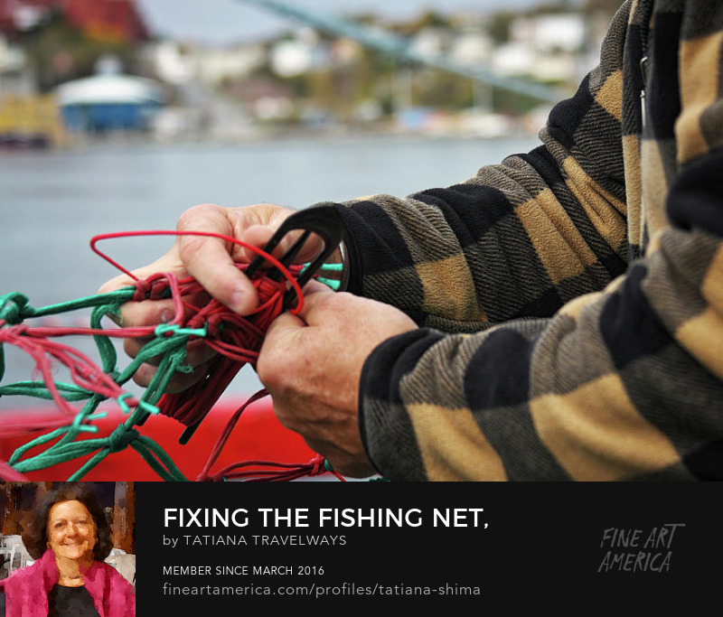 Fixing the fishing net, Newfoundland, Canada