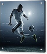 Soccer Player Kicking Ball In Stadium Acrylic Print