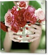A Woman Holding A Bowl Of Roses Acrylic Print