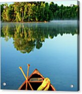 An Old Wooden Canoe On Calm Lake Acrylic Print