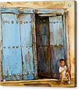 Child Sitting In Old Zanzibar Doorway Acrylic Print