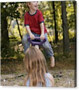Children Playing On A Seesaw Acrylic Print
