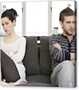 Couple Sitting On Sofa With Arms Folded, Looking Angry Acrylic Print