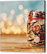 Donation Money Jar Filled With Coins In Front Of Holiday Lights Acrylic Print