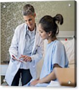 Female Doctor Showing Digital Tablet To Patient Acrylic Print