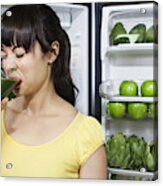 Grimacing Mixed Race Woman Drinking Healthy Drink Near Refrigerator Acrylic Print