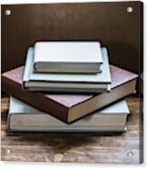 High Angle Close Up Of Stack Of Book S On Wooden Table. Acrylic Print