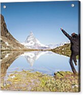 Hiker Jumping Toward Lake Near Acrylic Print