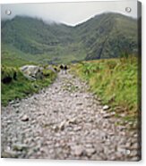 Hikers On A Long Trail Into The Acrylic Print