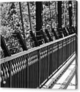 Leading Lines Of A Guard Rail And It's Shadows Acrylic Print