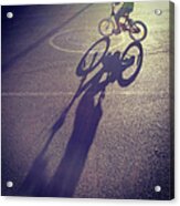 Long Shadow Of Child Riding A Bicycle Acrylic Print