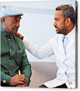 Male Doctor Consoling Senior Patient At Hospital Acrylic Print