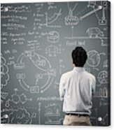 Man looking to formula and picture on blackboard Acrylic Print