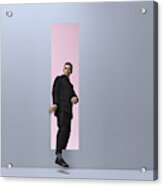 Man Walking Threw Rectangular Opening In Coloured Room Acrylic Print