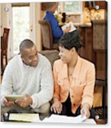 Parents In Living Room Working On Finances Acrylic Print