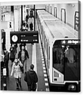 Passengers On Ubahn Train Platform As Train Leaves Friedrichstrasse U-bahn Station Berlin Germany Acrylic Print