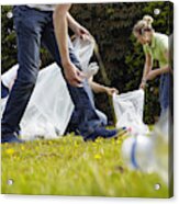 People Cleaning Up Litter On Grass Acrylic Print