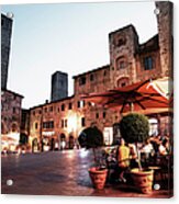 People Dining Outside Restaurants In A Acrylic Print