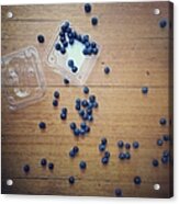 Punnet Of Blueberries Spilt On Wooden Acrylic Print