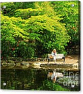 Reading At The Pond Acrylic Print