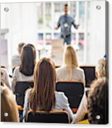 Rear View Of Business People Attending A Seminar In Board Room. Acrylic Print