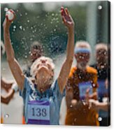 Senior Marathon Runner Refreshing Herself With Water During A Race. Acrylic Print
