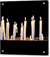 Several Candlelights Lit Up Against Black Background Acrylic Print