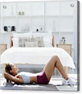Side View Of A Woman Doing Sit Ups On The Floor Acrylic Print