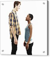 Side View Studio Portrait Showing Contrasting Height Of Young Couple Acrylic Print