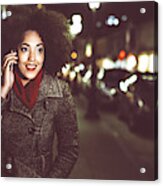 Smiling Young Woman Using Phone On Street By Night Acrylic Print