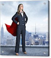 Superhero Businesswoman With Cityscape In The Background Acrylic Print