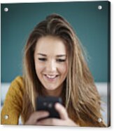 Teenage Girl In Bedroom Texting On Smartphone Acrylic Print