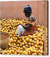 Woman Selling Oranges At Market In Ghana Acrylic Print