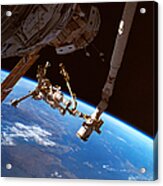 Astronauts Working On A Satellite In Space Acrylic Print