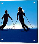Backlit Skiers Two Acrylic Print