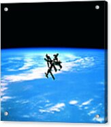 A Space Station In Orbit Above Earth Acrylic Print