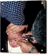 Doctor Examining The Ear Of A Baby Acrylic Print