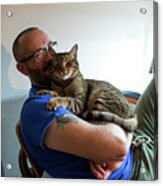Man With Glasses Holds His Brown Tabby Cat And Smiles Acrylic Print