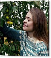 Smiling Woman Picking Lemons From Tree While Standing In Yard Acrylic Print