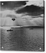 Sunset Over The Atlantic Finds Another United Nations Convoy Moving Peacefully Towards It Destination. A U.s. Navy Blimp, Hovering Watchfully Overhead, Is On The Lookout For Any Sign Of Enemy Submarines Acrylic Print
