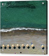 Aerial View From A Flying Drone Of Beach Umbrellas In A Row On An Empty Beach With Braking Waves. Acrylic Print