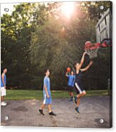 Players Playing Basketball At Court Against Trees On Sunny Day #1 Acrylic Print