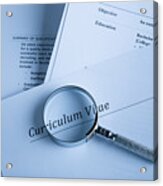 A Curriculum Vital And A Magnifying Glass Acrylic Print