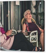 A Matured Asian Chinese Female Smoking And Talking To A Malay Female At Cafe Acrylic Print