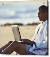A Young Man In Tan Shorts And A White Oxford Shirt Is Reclining In A Beach Chair Typing In To A Laptop Computer Acrylic Print
