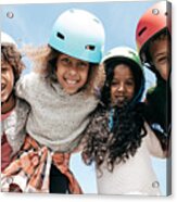 Adorable Multi-ethnic Group Of Kids Wearing Helmets And Looking To The Camera With Happiness Acrylic Print