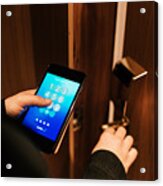 Businesswoman Entering Room With Mobile Phone. Acrylic Print