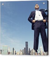 Confident Giant Businessman Standing Tall Over City Skyline Acrylic Print
